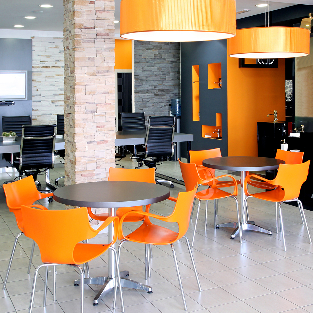 Office with orange chairs