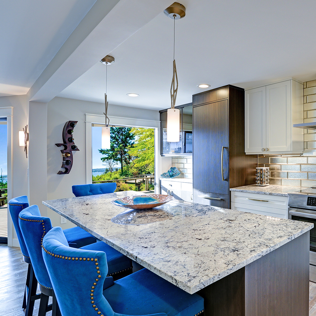 Kitchen island with blue counter stools