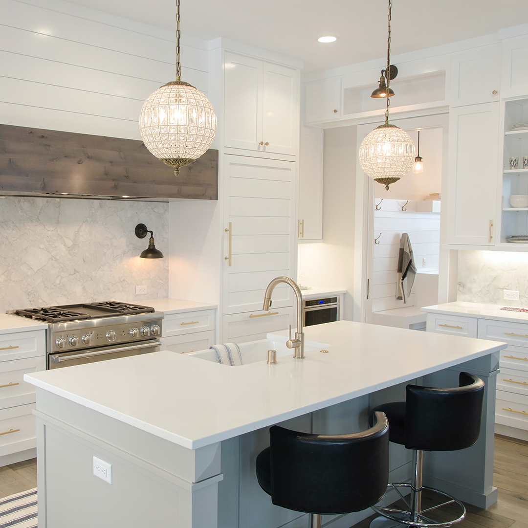 Kitchen with white cabinets and countertops